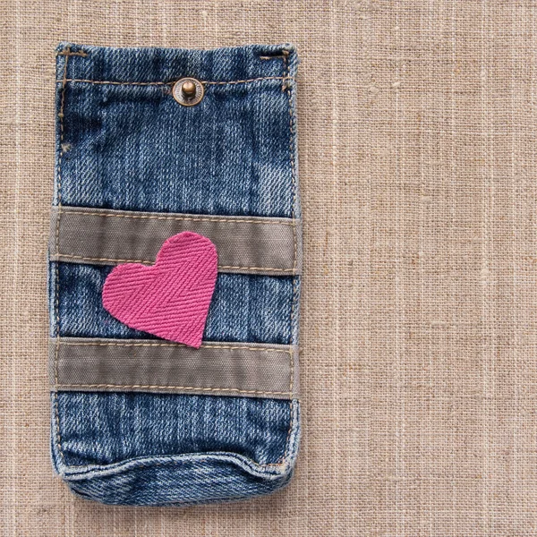 Pink heart on a jeans — Stock Photo, Image