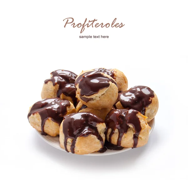 Homemade profiteroles with chocolate cream — Stock Photo, Image