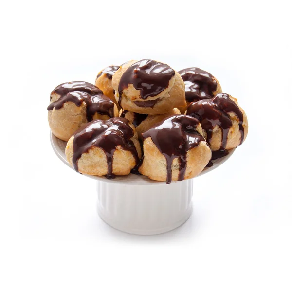 Homemade profiteroles with chocolate cream — Stock Photo, Image