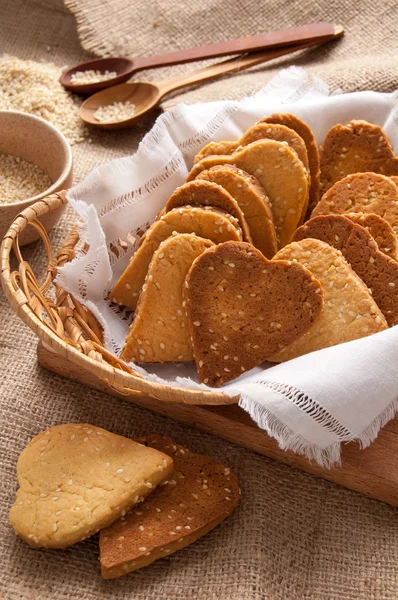 Cookies with sesame seeds in the shape of heart — Stock Photo, Image