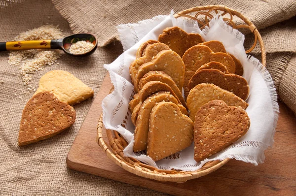 Cookies with sesame seeds in the shape of heart — Stock Photo, Image