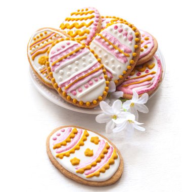 Colorful Easter cookies in the shape of egg clipart