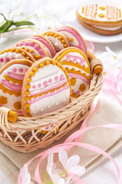 Colorful Easter cookies in the shape of egg clipart