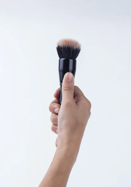 Brosse de maquillage isolée sur noir — Photo