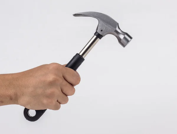 Man's hand holding hammer — Stock Photo, Image