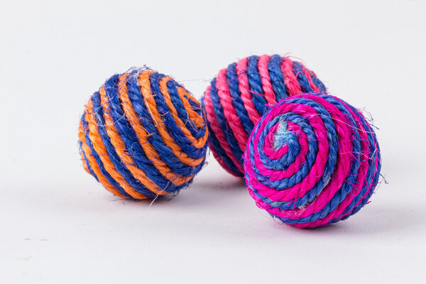 Toy ball for little kitten isolated on white background