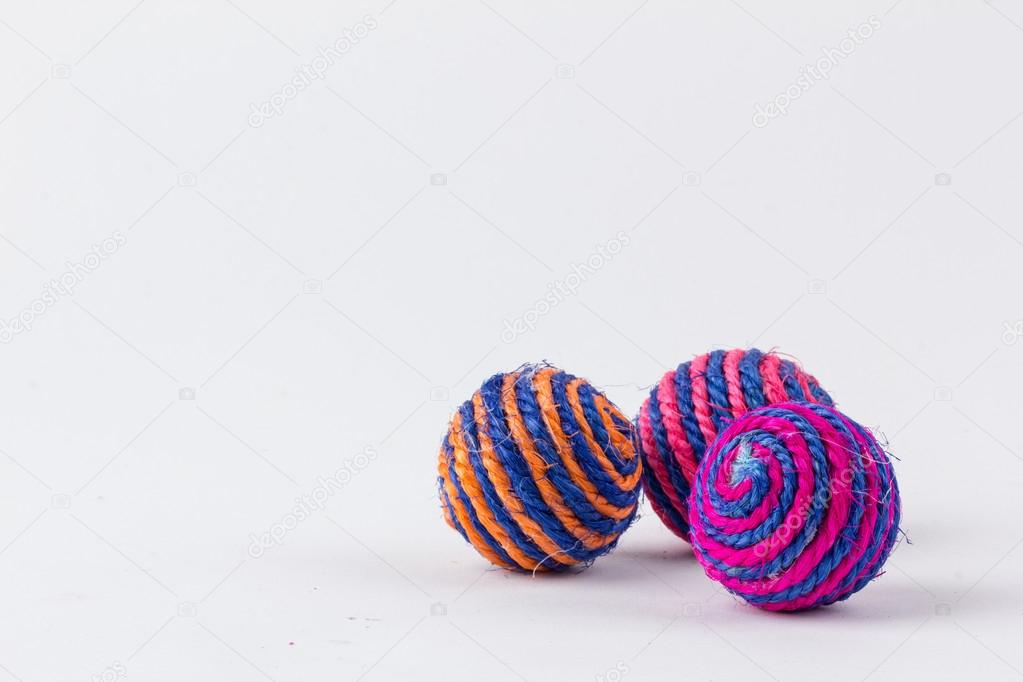 Toy ball for little kitten isolated on white background