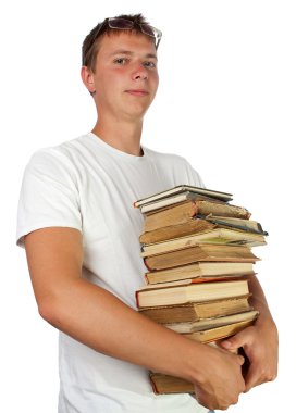 kitap yığını tutan genç erkek öğrenci