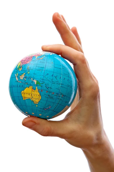 Hand taking a globe — Stock Photo, Image