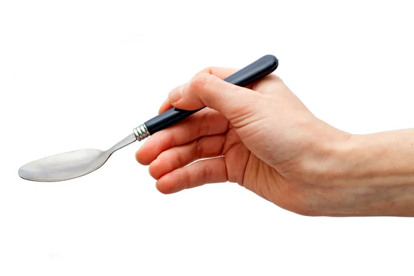 Hand with spoon — Stock Photo, Image