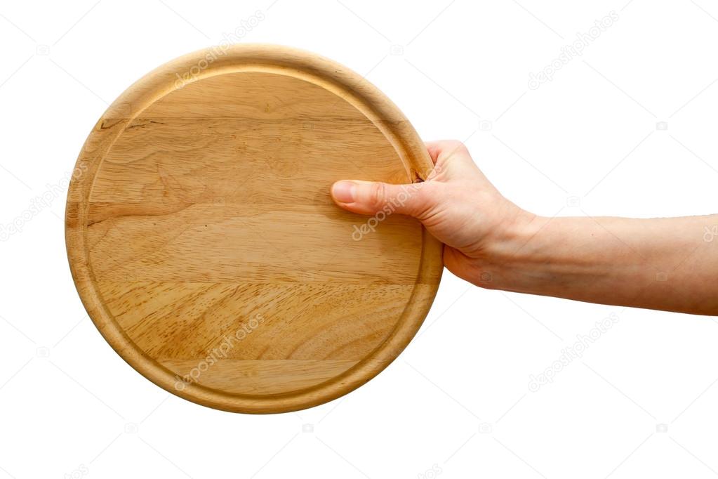 Hand holding round plate