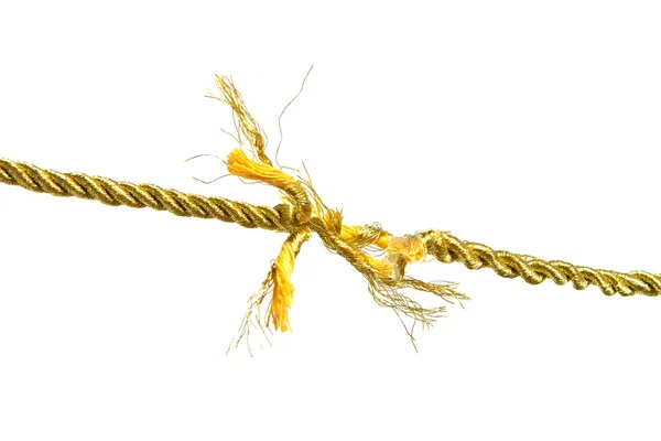 Порванная золотая веревка — стоковое фото