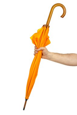 Sarı şemsiye tutan el