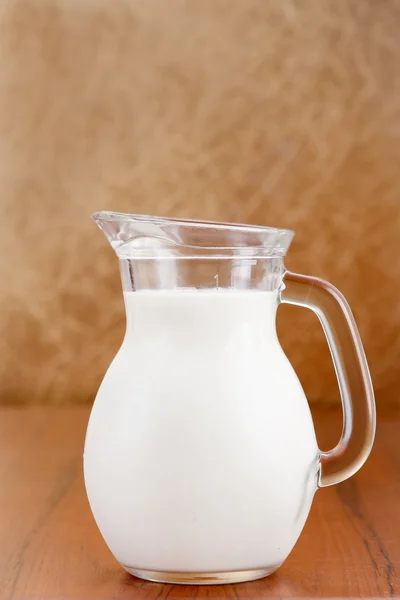 Glass jug of milk — Stock Photo, Image