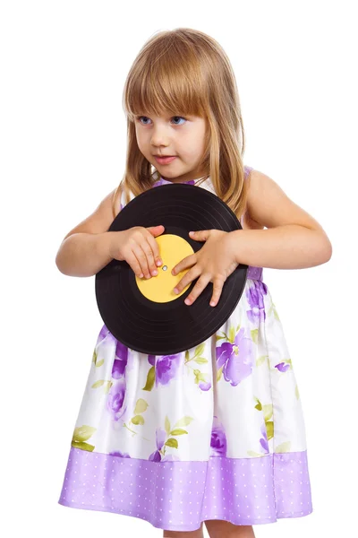 Attractive little girl holding vinyl record — Stock Photo, Image