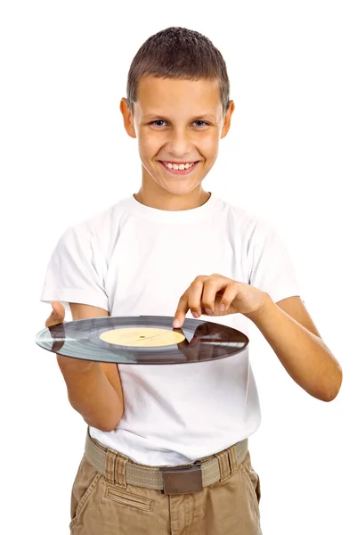 Boy in white shirt holding vinyl record — Stock Photo, Image