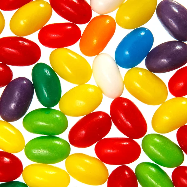 Color jelly beans over white — Stock Photo, Image