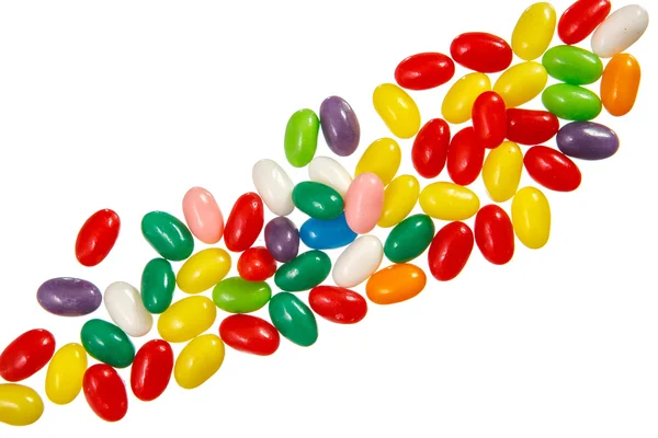 Color jelly beans over white — Stock Photo, Image