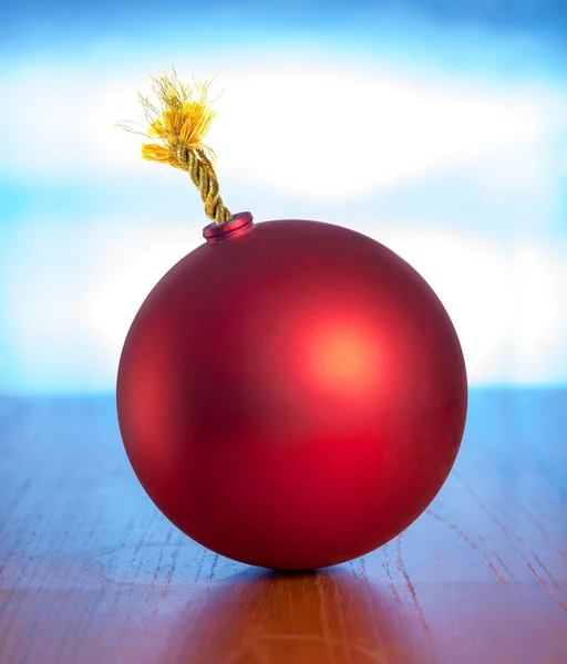 Red bomb with golden fuse — Stock Photo, Image