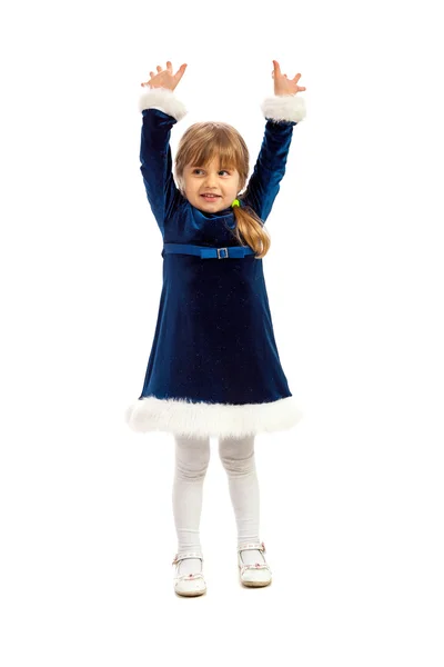 Ein kleines Mädchen in dunkelblauem Kleid hob die Hände — Stockfoto