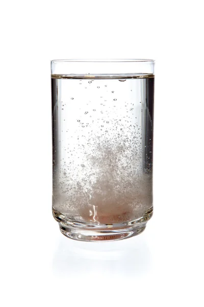 Tablet in glass of water — Stock Photo, Image