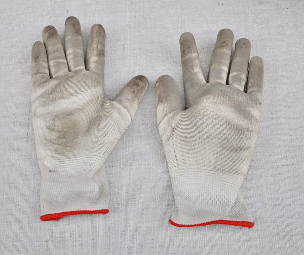Dirty gardening gloves — Stock Photo, Image