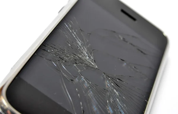 Mobile phone with broken screen — Stock Photo, Image