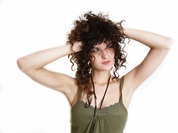 Young woman in green dress in funny pose — Stock Photo, Image