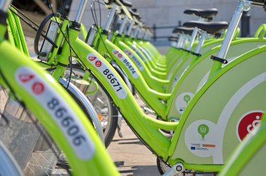 BUDAPEST, HUNGARY - JUNE 01 2014:Auckland waterfront bike hire.M clipart