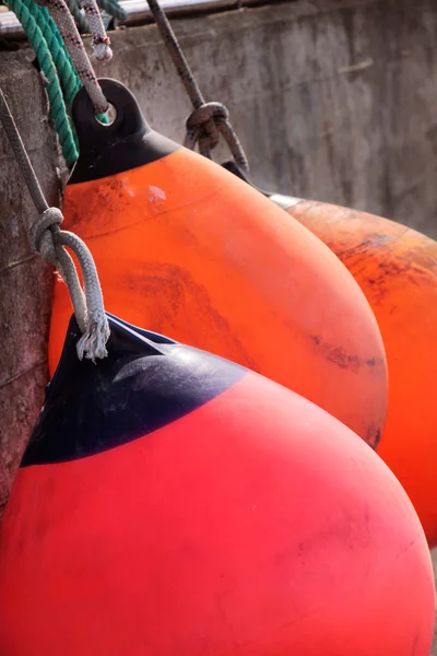 Red and orange buoys — Stock Photo, Image