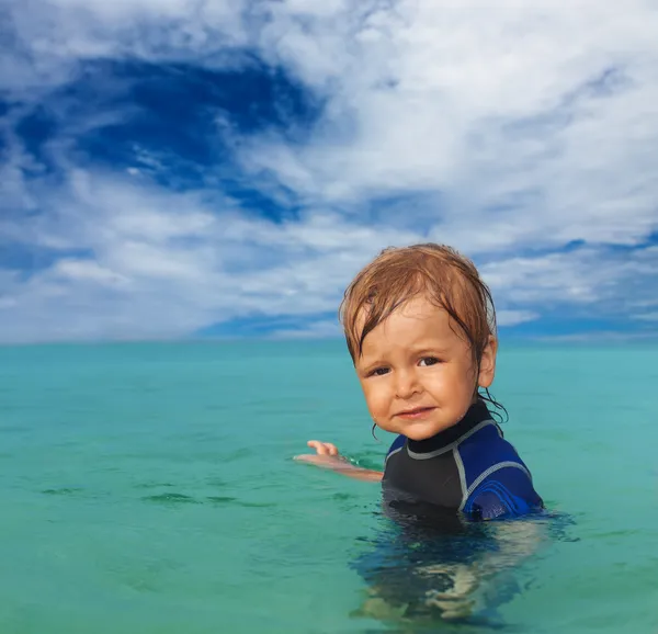 Cute kid in wetsuit — Stock Photo, Image
