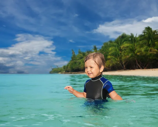 Little boy in the wetsuit — Stock Photo, Image