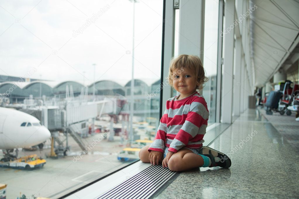 happy little kid in airport