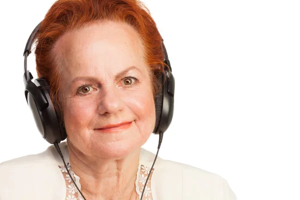 Senior positivo en auriculares — Foto de Stock