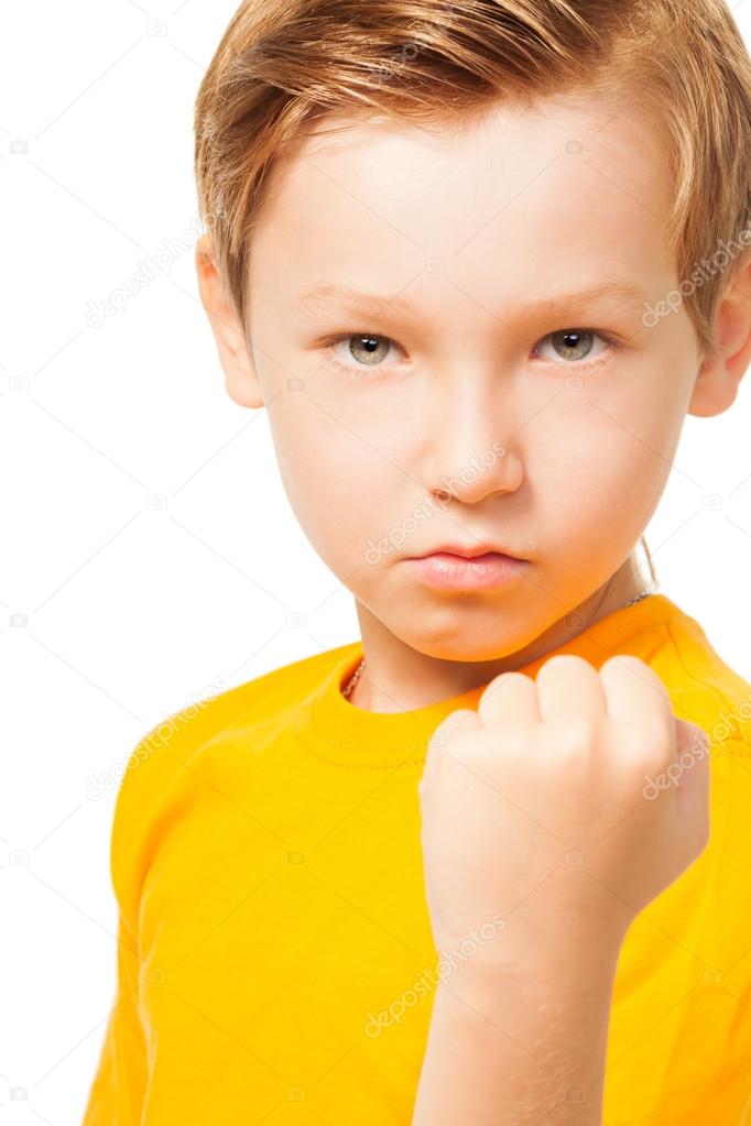 Bad tempered kid showing his fist