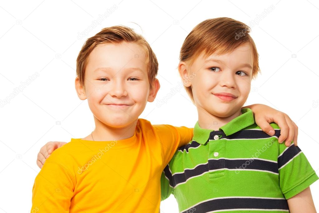 Two kids friends standing together