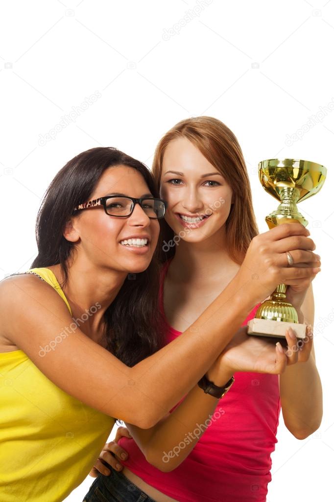 Two happy winners with prize