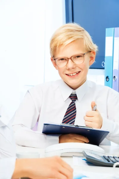 Kid pretending to be a boss — Stock Photo, Image