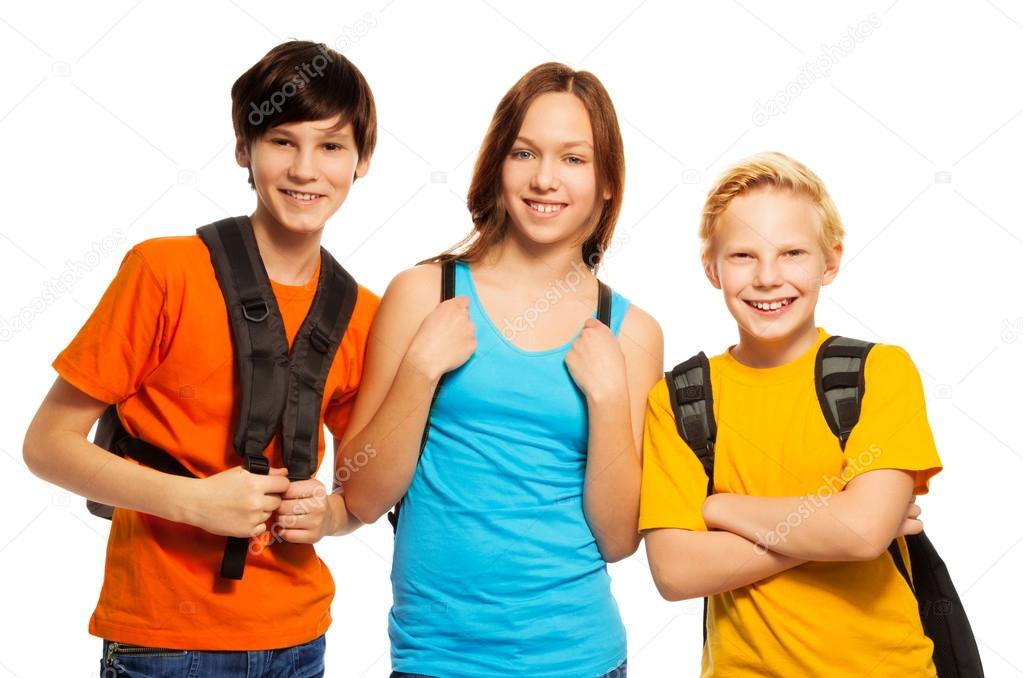 Three kids with school backpacks