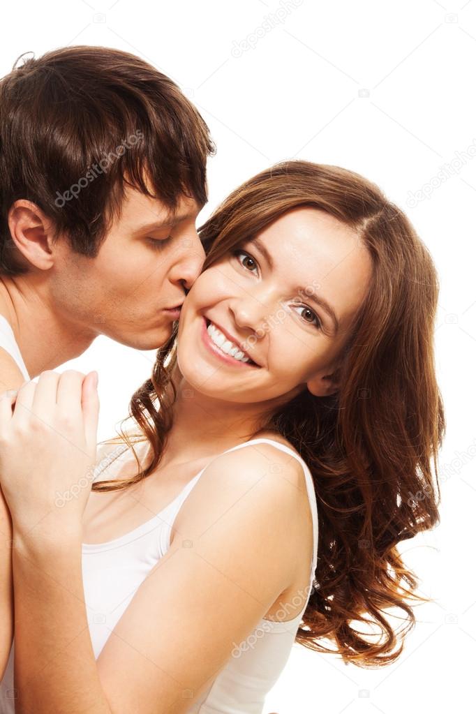 Young man kissing girl