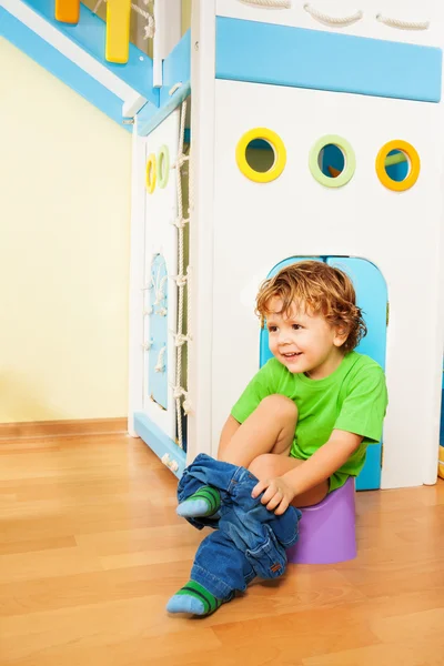 Putting off pants learning to use potty — Stock Photo, Image