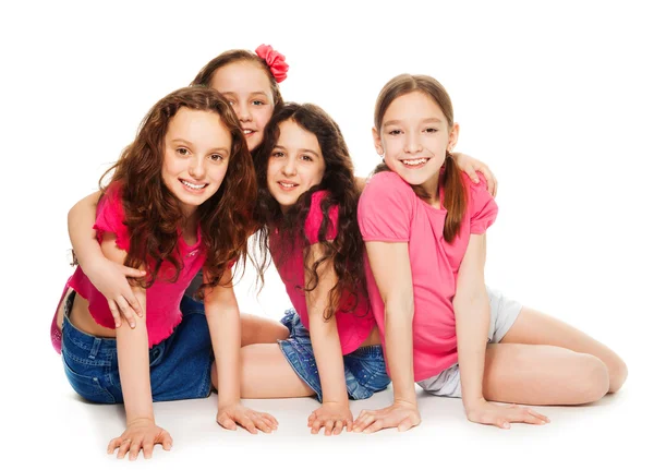 Čtyři děti dívky v růžové — Stock fotografie