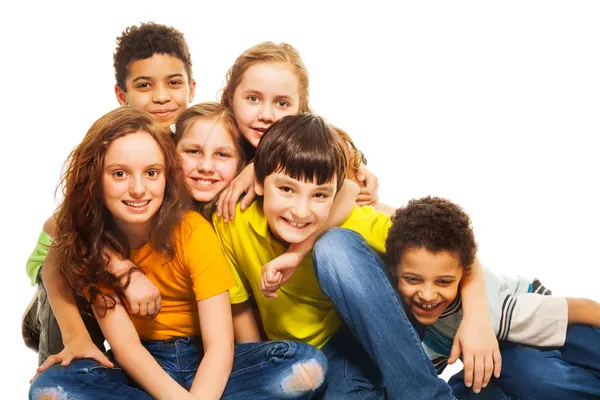 Group of hugging and laughing kids — Stock Photo, Image