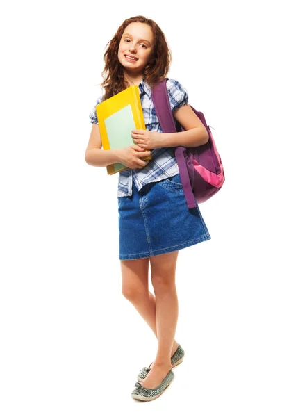 Дівчина-підліток з купою книг — стокове фото