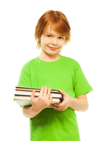 Niño inteligente con montón de libros —  Fotos de Stock