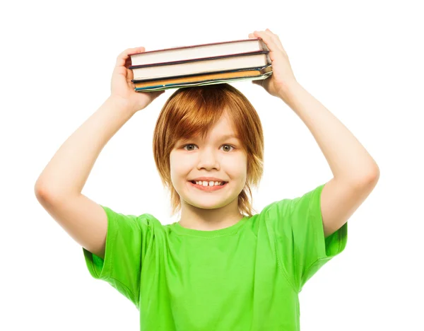 Slimme slimme jongen met stapel boeken — Stockfoto