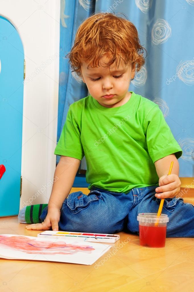 Occupied with painting Stock Photo by ©serrnovik 22246475