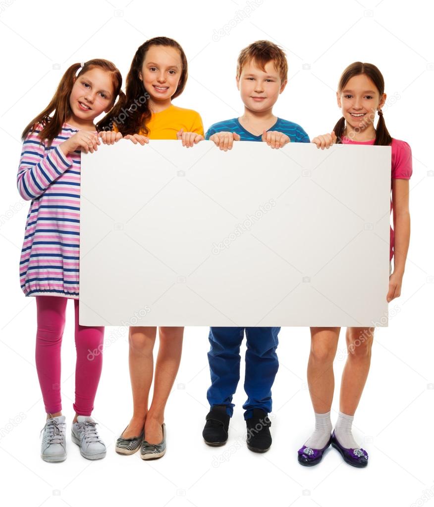 Four kids showing board with advertising