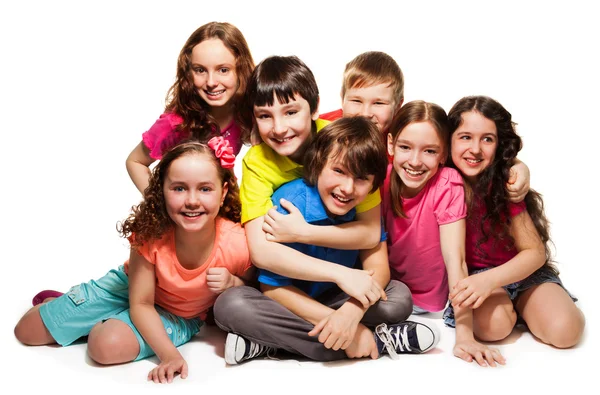 Group of happy hugging kids — Stock Photo, Image