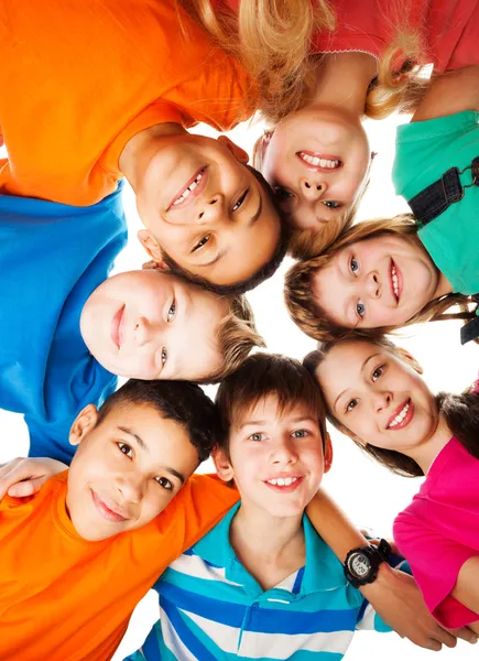 Circle of kids looking down — Stock Photo, Image